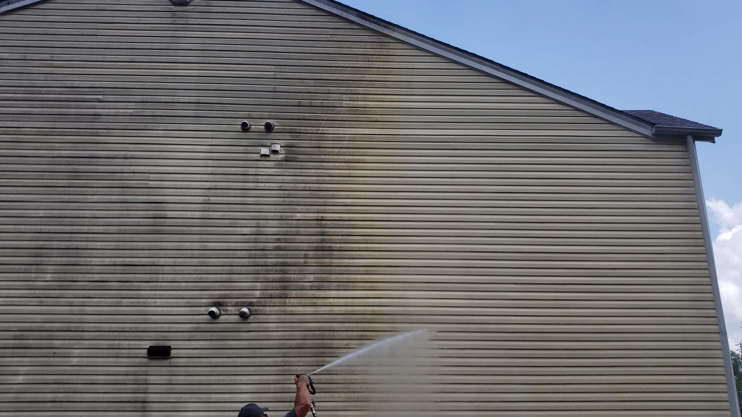 What is the difference between pressure washing and soft washing